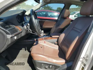 2011 BMW X5 35i with VIN 5UXZV4C54BL412770, listed as a Copart auction lot 53043825 with 148,612 mi miles and Clean Title. Bid and sale history available at carsss.com. Image 7.