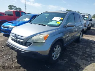 2007 Honda CR-V EX-L with VIN JHLRE48727C083105, listed as a IAAI auction lot 41750786 with 167,141 mi miles. Bid and sale history available at carsss.com. Image 2.