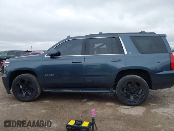 2020 Chevrolet Tahoe LT with VIN 1GNSKBKC3LR306946, listed as a IAAI auction lot 41570785 with 56,603 mi miles and . Bid and sale history available at DreamBid. Image 14.