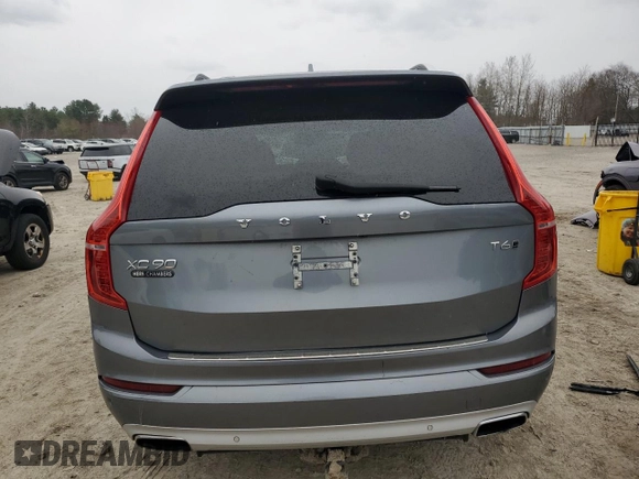 2017 Volvo XC90 Momentum z VIN YV4A22PK2H1105658, wystawiony jako Copart lot #52855065 z przebiegiem 114 938 mil mil oraz Szkody całkowita. Historia ofert i sprzedaży dostępna na DreamBid. Obrazek 6.