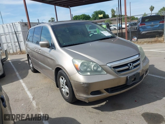 2005 Honda Odyssey EX-L z VIN 5FNRL38615B407908, wystawiony jako IAAI lot #42076045 z przebiegiem 170 950 mil mil oraz . Historia ofert i sprzedaży dostępna na DreamBid. Obrazek 1.