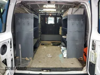 2013 Ford Econoline Cargo Commercial with VIN 1FTNE2EL5DDB27606, listed as a IAAI auction lot 42734078 with 122,369 mi miles and . Bid and sale history available at DreamBid. Image 9.