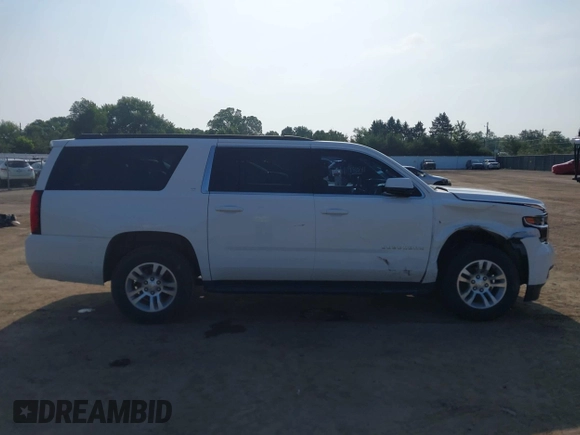 2020 Chevrolet Suburban LT z VIN 1GNSKHKC9LR198576, wystawiony jako IAAI lot #42498041 z przebiegiem 81 668 mil mil oraz . Historia ofert i sprzedaży dostępna na DreamBid. Obrazek 13.