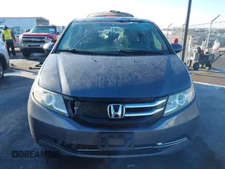 2014 Honda Odyssey EX-L with VIN 5FNRL5H61EB079739, listed as a IAAI auction lot 41659048 with 137,012 mi miles and . Bid and sale history available at carsss.com. Image 12.