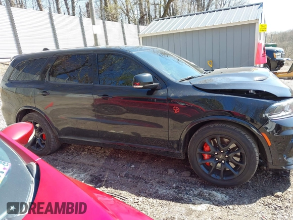 2023 Dodge Durango SRT Hellcat Premium with VIN 1C4SDJH91PC687665, listed as a IAAI auction lot 42070800 with 65,787 mi miles and . Bid and sale history available at DreamBid. Image 13.