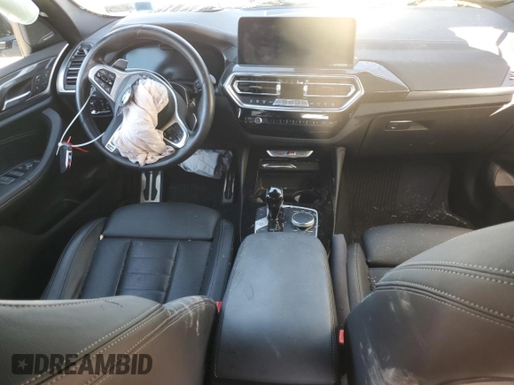 2023 BMW X4 M40i with VIN 5UX43DT05P9N61777, listed as a Copart auction lot 77600264 with 0 mi miles and Salvage Title. Bid and sale history available at carsss.com. Image 8.