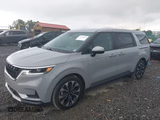 2024 Kia Carnival EX with VIN KNDNC5H31R6377648, listed as a IAAI auction lot 40124659 with 14,386 mi miles and . Bid and sale history available at DreamBid. Image 2.