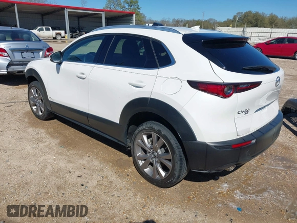 2022 Mazda CX-30 S Premium with VIN 3MVDMBDL1NM413540, listed as a IAAI auction lot 41681191 with 57,764 mi miles and . Bid and sale history available at carsss.com. Image 3.
