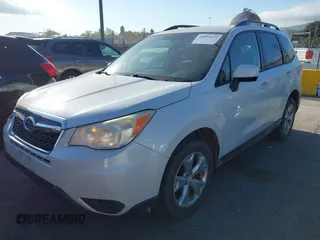 2014 Subaru Forester 2.5i Premium with VIN JF2SJACC4EG515701, listed as a IAAI auction lot 41872627 with 218,146 mi miles. Bid and sale history available at carsss.com. Image 2.