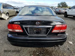 2002 Mazda Millenia z VIN JM1TA221421729790, wystawiony jako Copart lot #84460794 z przebiegiem 68 102 mil mil oraz Szkody całkowita. Historia ofert i sprzedaży dostępna na DreamBid. Obrazek 6.
