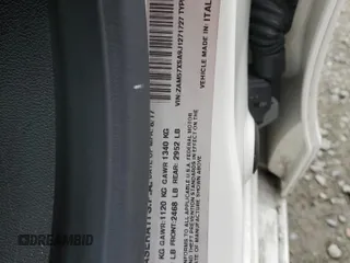 2018 Maserati Ghibli z VIN ZAM57XSA9J1271727, wystawiony jako Copart lot #52155305 z przebiegiem 62 081 mil mil oraz Szkoda całkowita • Salvage title. Historia ofert i sprzedaży dostępna na DreamBid. Obrazek 12.