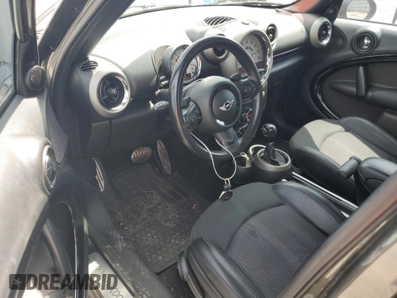 2012 MINI Countryman S with VIN WMWZC5C5XCWL56232, listed as a Copart auction lot 60298705 with 140,425 mi miles and Salvage title. Bid and sale history available at DreamBid. Image 8.
