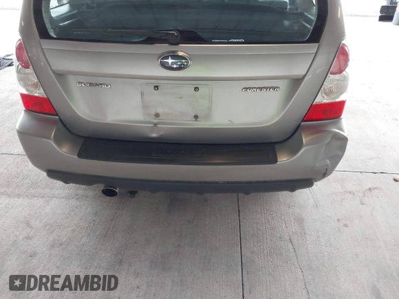 2007 Subaru Forester X w/Premium Pkg with VIN JF1SG65627H710720, listed as a IAAI auction lot 41489413 with 147,158 mi miles. Bid and sale history available at carsss.com. Image 6.