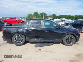 2022 Hyundai Santa Cruz SEL with VIN 5NTJBDAE2NH000464, listed as a IAAI auction lot 42329921 with 32,890 mi miles and . Bid and sale history available at DreamBid. Image 13.