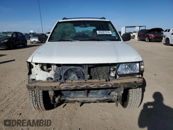 2001 Isuzu Rodeo S z VIN 4S2DM58W114306215, wystawiony jako Copart lot #85287914 z przebiegiem 157 844 mil mil oraz Szkoda całkowita • Salvage title. Historia ofert i sprzedaży dostępna na DreamBid. Obrazek 5.