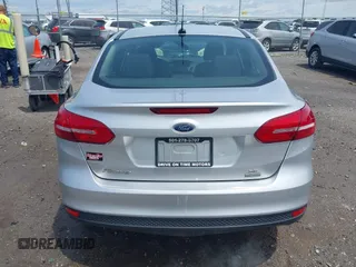 2017 Ford Focus SE with VIN 1FADP3FE4HL295573, listed as a IAAI auction lot 39562568 with 96,939 mi miles and . Bid and sale history available at carsss.com. Image 16.