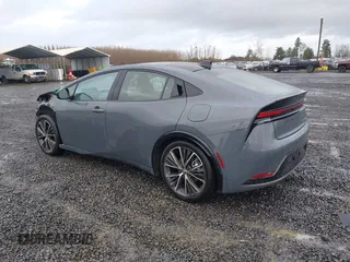 2024 Toyota Prius LE z VIN JTDADABU4R3015000, wystawiony jako IAAI lot #41147221 z przebiegiem 4 411 mil mil oraz . Historia ofert i sprzedaży dostępna na DreamBid. Obrazek 3.