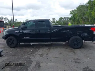 2011 Toyota Tundra 2WD Truck SR with VIN 5TFTY5F14BX007238, listed as a IAAI auction lot 41663289 with 126,499 mi miles. Bid and sale history available at carsss.com. Image 6.