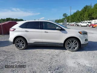 2019 Ford Edge Titanium with VIN 2FMPK3K95KBB34764, listed as a IAAI auction lot 42719541 with 128,028 mi miles and . Bid and sale history available at DreamBid. Image 13.