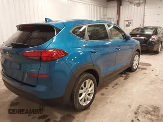 2019 Hyundai Tucson SE with VIN KM8J2CA48KU027746, listed as a IAAI auction lot 41986052 with 93,261 mi miles. Bid and sale history available at carsss.com. Image 4.