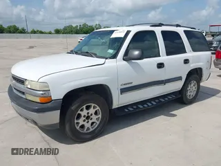 2002 Chevrolet Tahoe LS z VIN 1GNEC13Z42R214489, wystawiony jako IAAI lot #42438810 z przebiegiem 243 161 mil mil oraz . Historia ofert i sprzedaży dostępna na DreamBid. Obrazek 2.