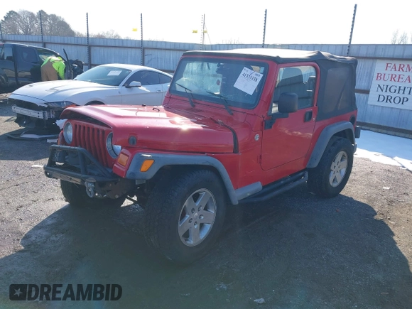 2005 Jeep Wrangler X with VIN 1J4FA39S95P385581, listed as a IAAI auction lot 41333338 with 150,010 mi miles and . Bid and sale history available at DreamBid. Image 2.
