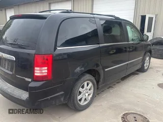 2010 Chrysler Town & Country Touring with VIN 2A4RR5D17AR431823, listed as a Copart auction lot 54990505 with 200,459 mi miles and Clean Title. Bid and sale history available at carsss.com. Image 4.