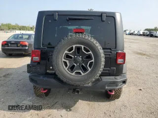 2015 Jeep Wrangler Rubicon Hard Rock z VIN 1C4BJWCG9FL714606, wystawiony jako Copart lot #68521014 z przebiegiem 35 187 mil mil oraz Szkoda całkowita • Salvage title. Historia ofert i sprzedaży dostępna na DreamBid. Obrazek 6.