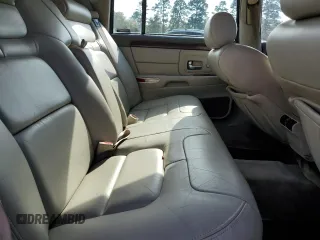 1998 Cadillac DeVille with VIN 1G6KD54Y7WU751207, listed as a Copart auction lot 82708584 with 185,132 mi miles and Salvage Title. Bid and sale history available at carsss.com. Image 10.