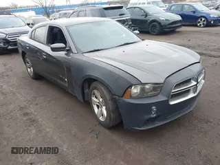 2014 Dodge Charger SE with VIN 2C3CDXBG1EH174977, listed as a IAAI auction lot 41792264 with 1 mi miles. Bid and sale history available at carsss.com. Image 1.