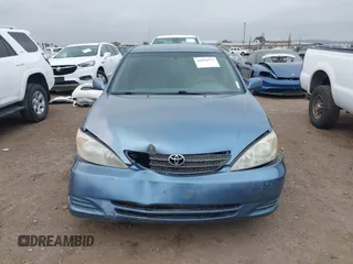 2004 Toyota Camry LE with VIN 4T1BF32K54U572537, listed as a IAAI auction lot 41850322 with 167,076 mi miles and . Bid and sale history available at DreamBid. Image 12.