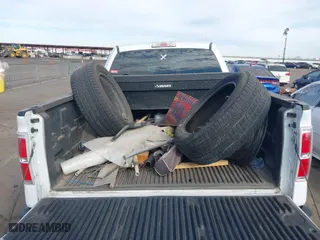 2014 Ford F-150 XL with VIN 1FTMF1CM3EKG36797, listed as a IAAI auction lot 40892574 with 136,417 mi miles. Bid and sale history available at carsss.com. Image 8.