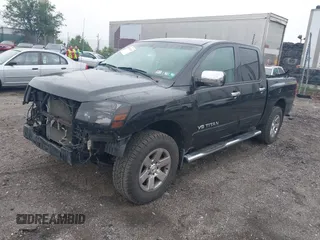 2011 Nissan Titan Pro-4X with VIN 1N6BA0ECXBN319157, listed as a IAAI auction lot 42456725 with 169,434 mi miles and . Bid and sale history available at DreamBid. Image 2.