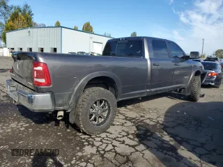 2020 Ram 3500 Laramie with VIN 3C63R3JL3LG240972, listed as a Copart auction lot 77382524 with 99,918 mi miles and Salvage Title. Bid and sale history available at carsss.com. Image 3.