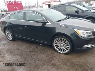 2014 Buick LaCrosse Premium II with VIN 1G4GF5G39EF305104, listed as a IAAI auction lot 41715121 with 81,341 mi miles and . Bid and sale history available at DreamBid. Image 13.