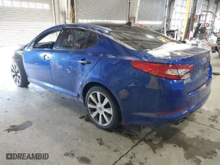 2012 Kia Optima SX with VIN 5XXGR4A69CG072557, listed as a IAAI auction lot 41318325 with 185,271 mi miles. Bid and sale history available at carsss.com. Image 3.