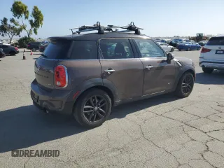 2013 MINI Countryman S ALL4 z VIN WMWZC5C51DWP30390, wystawiony jako Copart lot #59869105 z przebiegiem 111 843 mil mil oraz Szkoda całkowita • Salvage title. Historia ofert i sprzedaży dostępna na DreamBid. Obrazek 3.