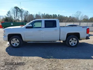 2018 Chevrolet Silverado 1500 LT with VIN 3GCUKREC3JG504431, listed as a IAAI auction lot 41609921 with 192,742 mi miles. Bid and sale history available at carsss.com. Image 14.