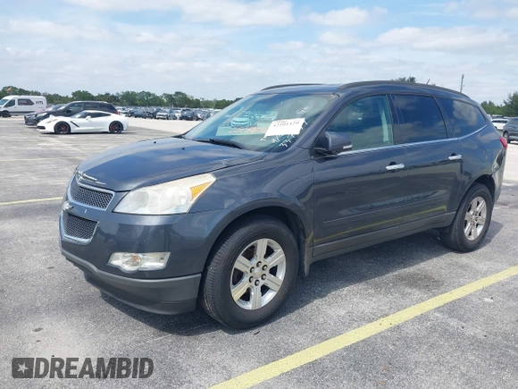 2012 Chevrolet Traverse 1LT z VIN 1GNKVGED1CJ337359, wystawiony jako IAAI lot #42101429 z przebiegiem 196 445 mil mil oraz . Historia ofert i sprzedaży dostępna na DreamBid. Obrazek 2.