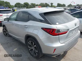 2017 Lexus RX 350 z VIN 2T2ZZMCAXHC052984, wystawiony jako IAAI lot #42273947 z przebiegiem 128 019 mil mil oraz . Historia ofert i sprzedaży dostępna na DreamBid. Obrazek 3.