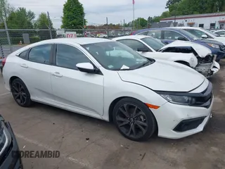 2021 Honda Civic Sport z VIN 2HGFC2F82MH511755, wystawiony jako IAAI lot #41990160 z przebiegiem 44 277 mil mil oraz . Historia ofert i sprzedaży dostępna na DreamBid. Obrazek 13.