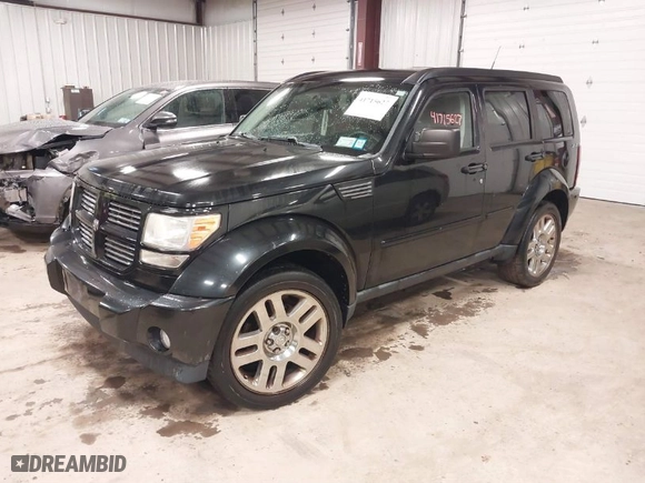 2011 Dodge Nitro Heat with VIN 1D4PU4GX0BW517654, listed as a IAAI auction lot 41715627 with 107,954 mi miles. Bid and sale history available at carsss.com. Image 2.