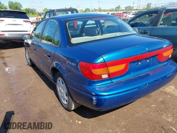 2002 Saturn SL with VIN 1G8ZK52742Z289921, listed as a IAAI auction lot 42340896 with 165,328 mi miles and . Bid and sale history available at DreamBid. Image 3.