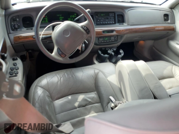 1999 Mercury Grand Marquis LS with VIN 2MEFM75WXXX682027, listed as a Copart auction lot 53906165 with 116,616 mi miles and Salvage Title. Bid and sale history available at DreamBid. Image 8.