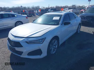 2021 Acura TLX Technology z VIN 19UUB6F41MA006805, wystawiony jako IAAI lot #41869747 z przebiegiem 59 228 mil mil oraz . Historia ofert i sprzedaży dostępna na DreamBid. Obrazek 2.