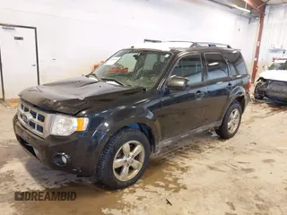 2011 Ford Escape Limited with VIN 1FMCU9EG0BKC29115, listed as a IAAI auction lot 41605426 with 189,187 mi miles. Bid and sale history available at carsss.com. Image 2.