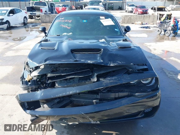 2021 Dodge Challenger R/T Scat Pack z VIN 2C3CDZFJXMH509833, wystawiony jako IAAI lot #41516858 z przebiegiem 66 880 mil mil oraz . Historia ofert i sprzedaży dostępna na DreamBid. Obrazek 12.