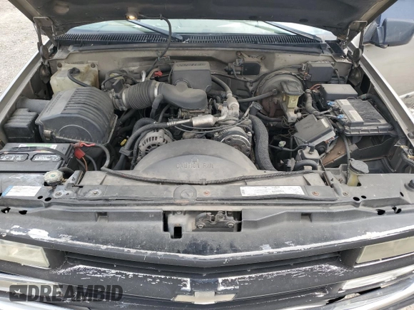 1999 Chevrolet Tahoe Z71 with VIN 1GNEK13R6XJ301562, listed as a Copart auction lot 59684595 with 200,561 mi miles and Salvage title. Bid and sale history available at DreamBid. Image 12.