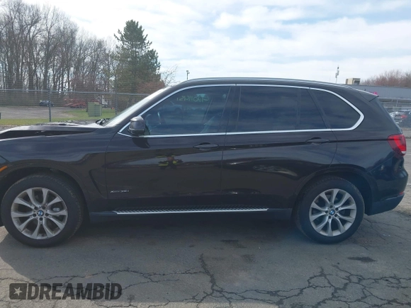 2014 BMW X5 xDrive35i with VIN 5UXKR0C57E0H20944, listed as a IAAI auction lot 42011451 with 208,205 mi miles. Bid and sale history available at carsss.com. Image 14.