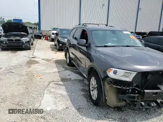 2014 Dodge Durango SXT with VIN 1C4RDJAG5EC971319, listed as a Copart auction lot 60065765 with Not provided miles and Non repairable. Bid and sale history available at DreamBid. Image 14.